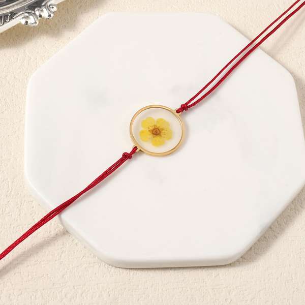 Celestial Resin Gold Rakhi