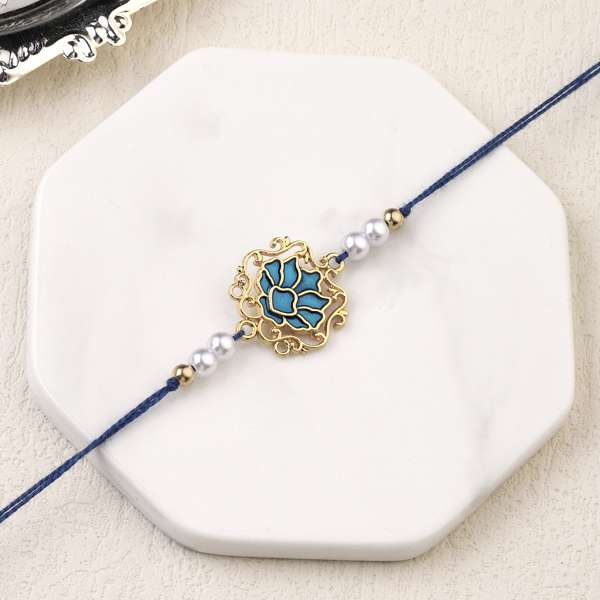 Tranquil Blue Lotus Pearl Rakhi