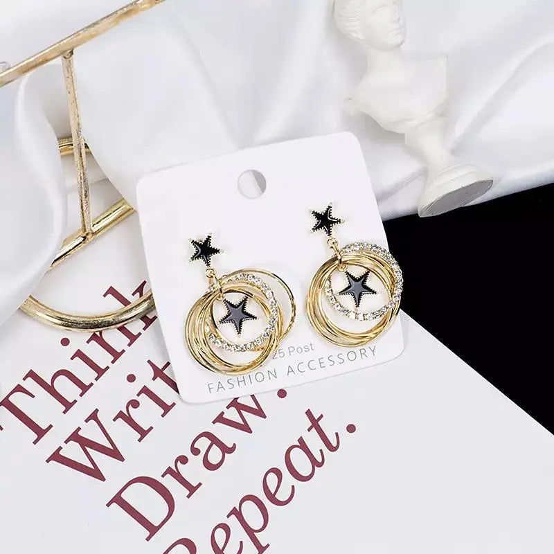 Double Star Black Enamel Circle Earrings | Salty