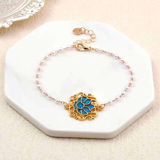 Serenity Lotus Blue Charm Gold Bracelet