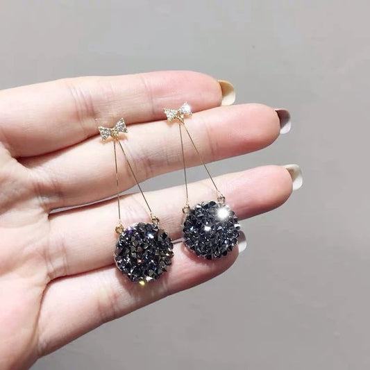 Black Studded Bow Sleek Earrings