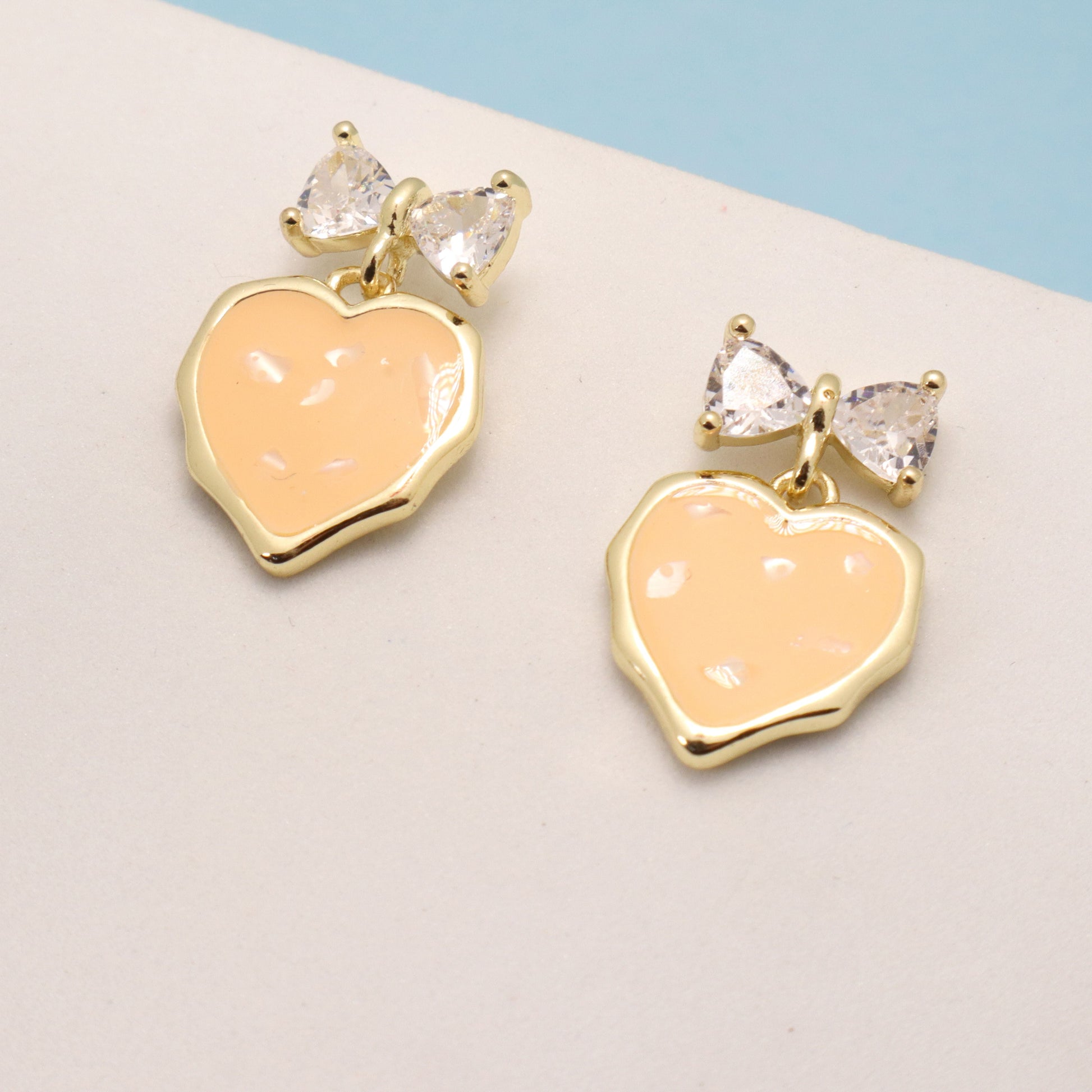 Cantaloupe Heart Bow Earrings