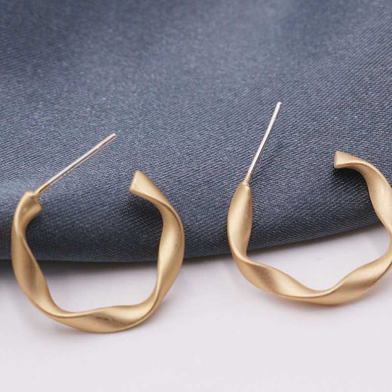 Gold Shine Twisted Round Hoop Earrings