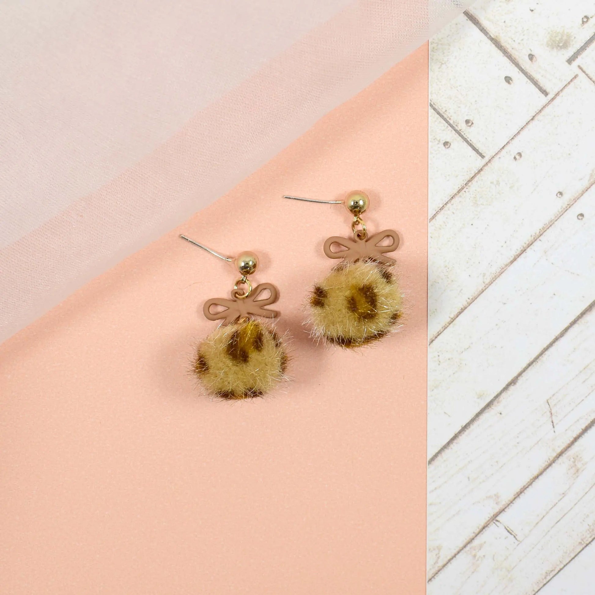 Leopard print fur ball brown bow drop earrings