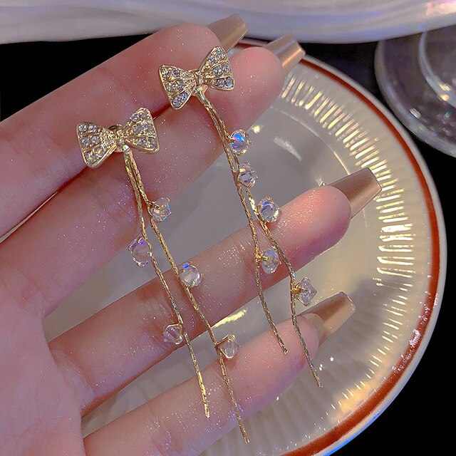 Lusty Bow Tassel Earrings Salty