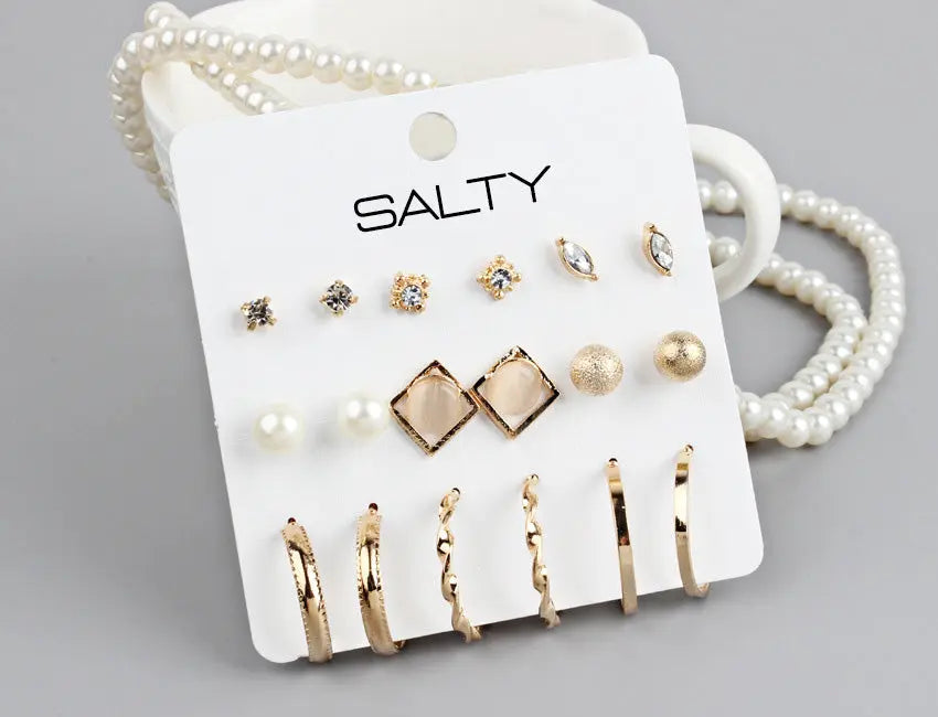 Set of 9 Gold Huggie Hoop Earrings and Studs