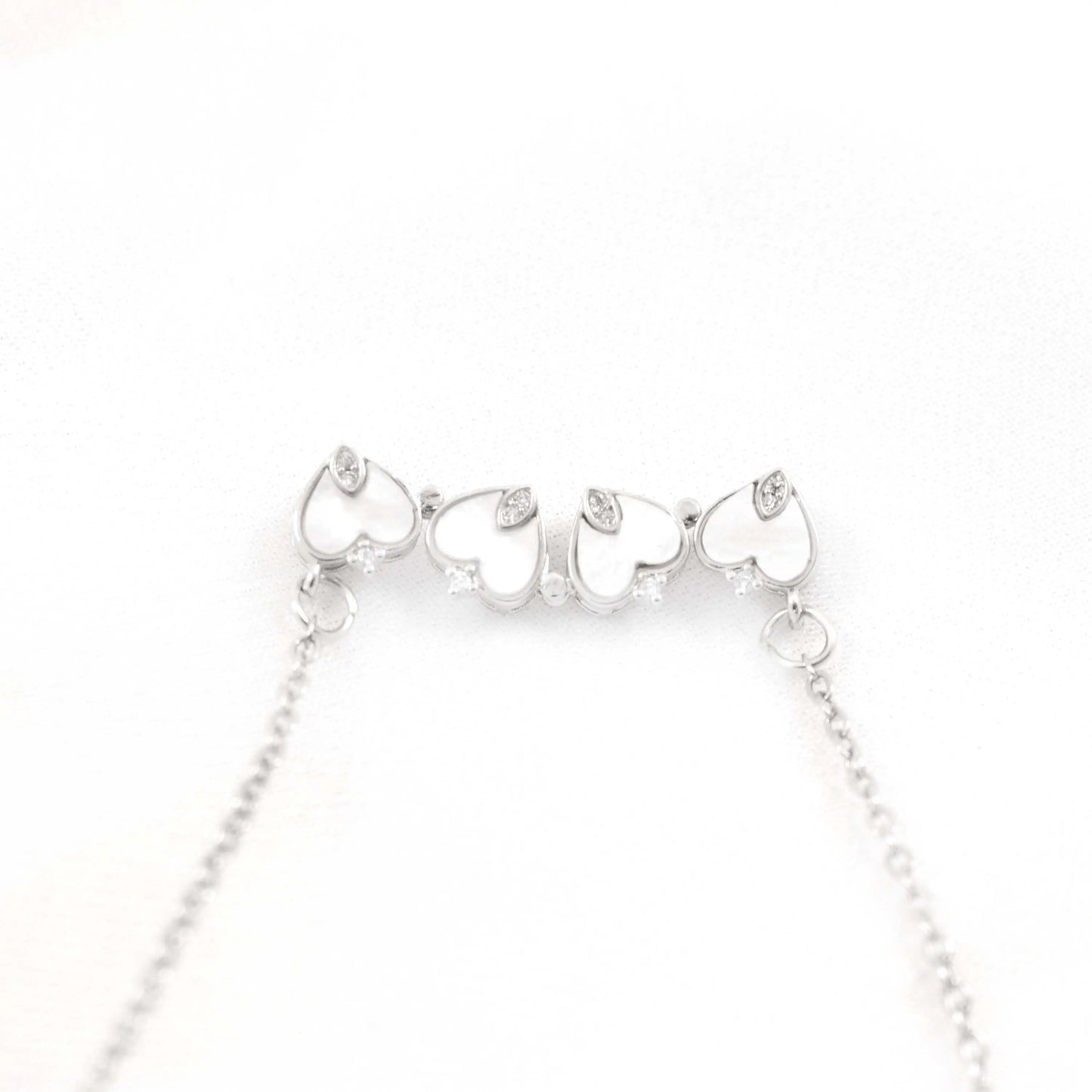 silver clover magnetic heart necklace